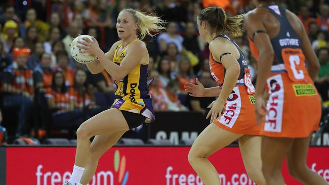 Forget contact — these athletes need contracts. Sunshine Coast Lightning’s Laura Langman takes possession against the GWS Giants at the Brisbane Entertainment Centre. (Pic: Peter Wallis)