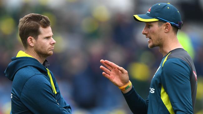 Steve Smith, left, chats with Cameron Bancroft before the start of play at Headingley. Picture: Getty Images