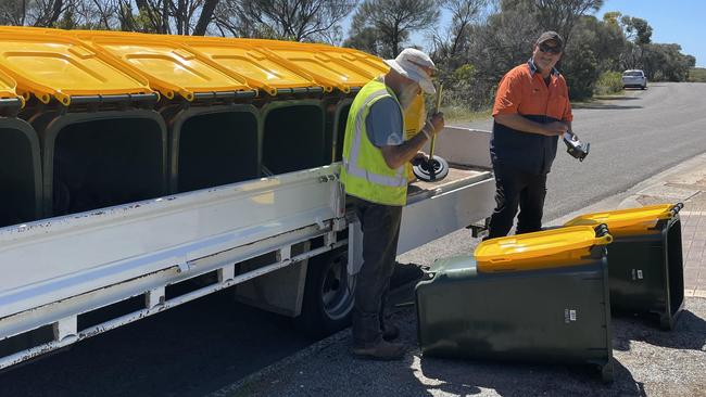 The yellow lid recycling bins were distributed to residents in Coffin Bay last week. Picture: Micaela Stark