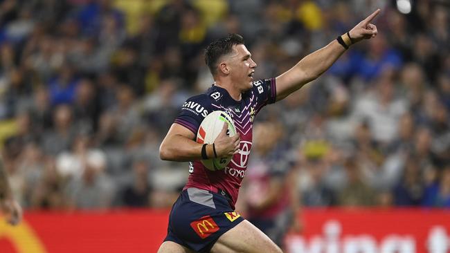 Scott Drinkwater of the Cowboys runs to score a try during the round 21 NRL match between North Queensland Cowboys and Parramatta Eels at Qld Country Bank Stadium on July 22, 2023 in Townsville, Australia. (Photo by Ian Hitchcock/Getty Images)