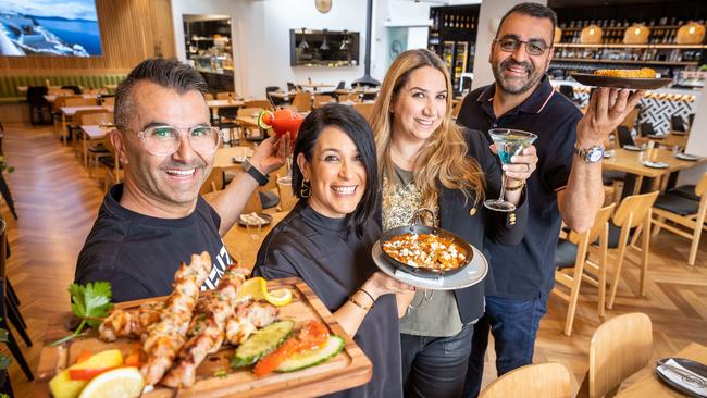 Business partners Mike Horomidis, Valencia Apolakiatis, Pamela and George Spiropoulos are behind Greca St, Oakleigh’s newest Greek restaurant. Picture: Jake Nowakowski