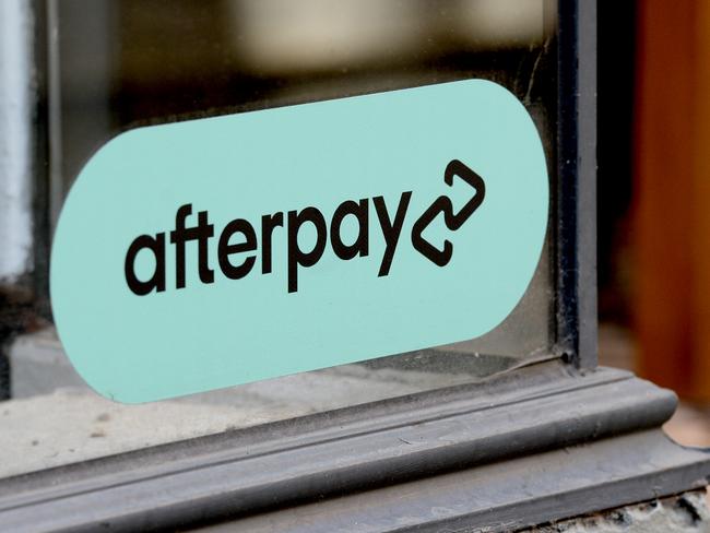 MELBOURNE, AUSTRALIA - NewsWire Photos APRIL 30, 2021: Stock Image of Afterpay logo in a shop window on Little Collins Street, Melbourne. Picture: NCA NewsWire / Andrew Henshaw