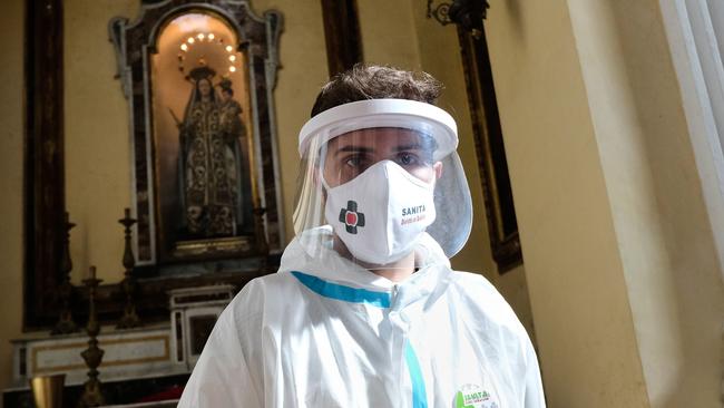 A health worker during a rapid antigen testing campaign for Covid-19 at the Basilica of San Severo fuori le mura in Naples, Italy. Picture: AFP