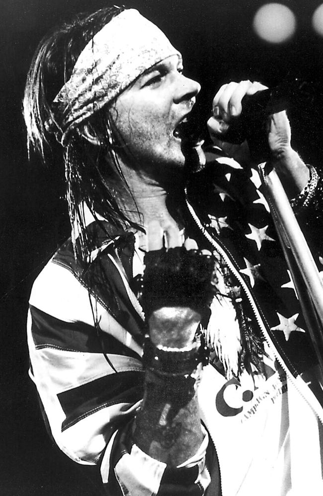 November reign ... Guns N’Roses’ Axl Rose in 1991, long before the dreaded cornrow hairstyle.