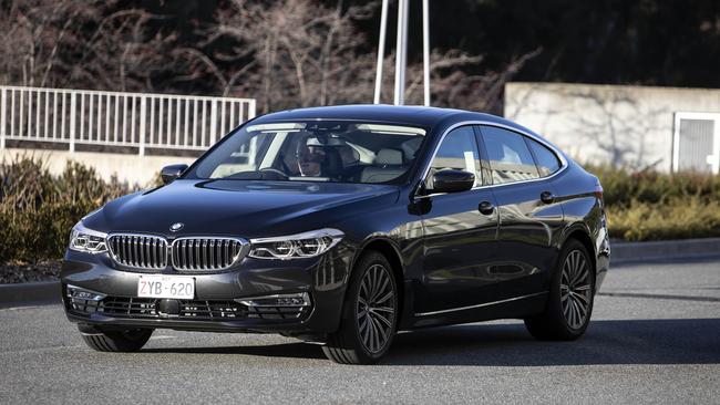 Australia's federal politicians, judges and high-ranking visitors can be chauffeured around in electric BMWs. Picture: NCA NewsWire