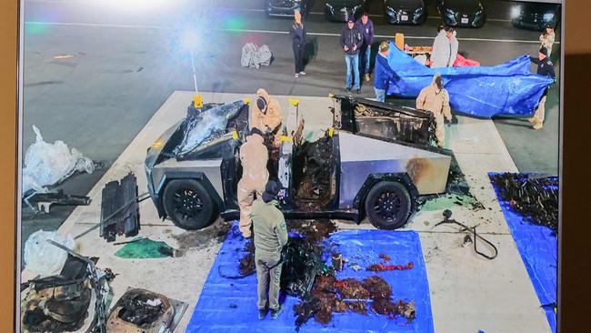 A monitor displays an image of authorities investigating a Tesla Cybertruck that exploded on New Year's Day in front of the entrance to the Trump International Hotel &amp; Tower Las Vegas. Picture: Getty Images/AFP