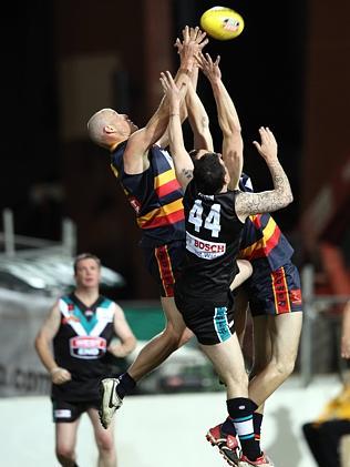 Former Adelaide Crow Ian Perrie, pictured during a Slowdown charity match, has won the Great Southern Football League’s Mail Medal and premiership with Encounter Bay.