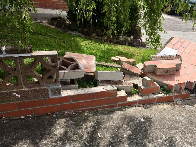 A brick front fence in Wright St, Essendon, which is claimed to have been knocked over three times by council rubbish truck. Picture: Supplied