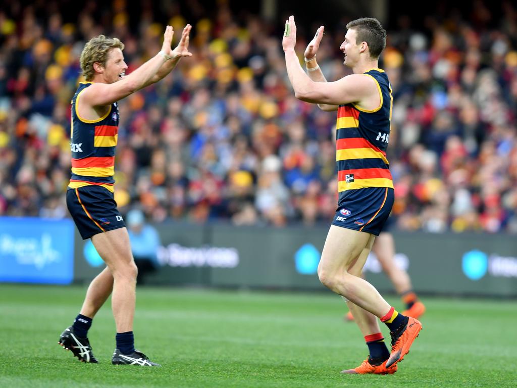 Now a member of the Crows leadership group, Josh Jenkins (right) will provide support for co-captain Rory Sloane. Picture: AAP Image/Kelly Barnes