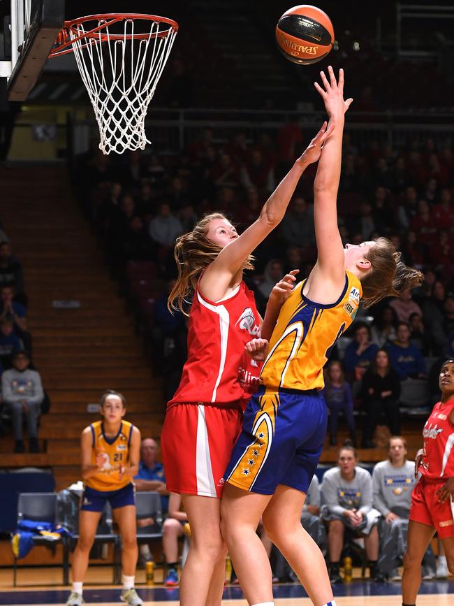 Forestville’s Hannah Hank is defended by North Adelaide’s Tayla Corrigan. Picture: AAP/Mark Brake.