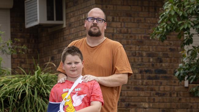 Jeremy Di Sessa with his son Callum (9) were asked to pay an extra $40,000 for a house and land package at Christies Beach – to cover increased labour and material costs. Picture: Kelly Barnes