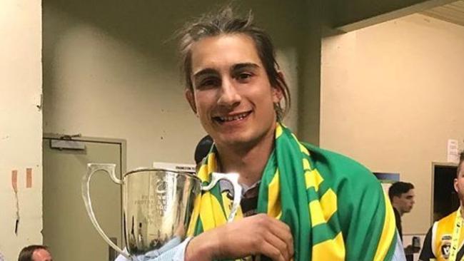 Happier times: Luke Paynter celebrates Frankston YCW's 2017 flag win last September.