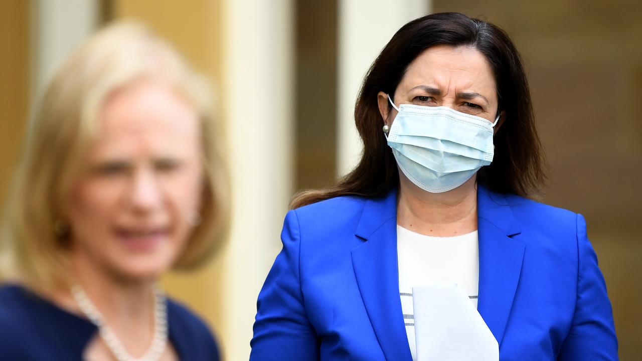 Premier Annastacia Palaszczuk listens to Chief Health Officer Dr Jeannette Young during a press conference in Brisbane. Picture: NCA NewsWire / Dan Peled