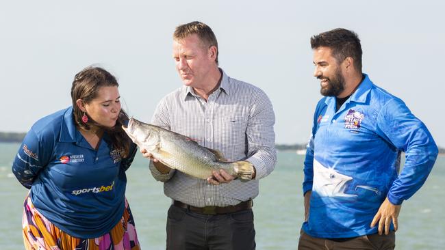 Major Events Minister Paul Kirby (middle) and Sportsbet manager Thijs Bors (right) handed over a major prize to Darwin local Nicole Soltesz when she won a $20,000 barra in Season 8. Picture: Floss Adams.