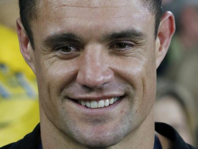 Dan Carter of New Zealand poses with Webb Ellis Cup after beating Australia to win the Rugby World Cup final match at Twickenham in London, Britain, October 31, 2015. REUTERS/Paul Childs