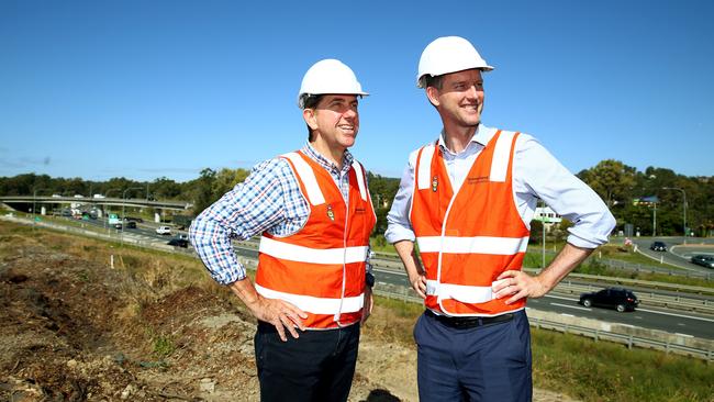 State Development Minister Cameron Dick and Transport Minister Mark Bailey pictured overlooking the M1 at Varsity talk about funding for the highway. Pic: Adam Head.