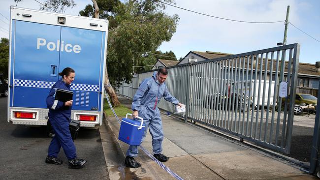 Police investigators at the scene of Jason Fry’s murder. Picture: Alison Wynd