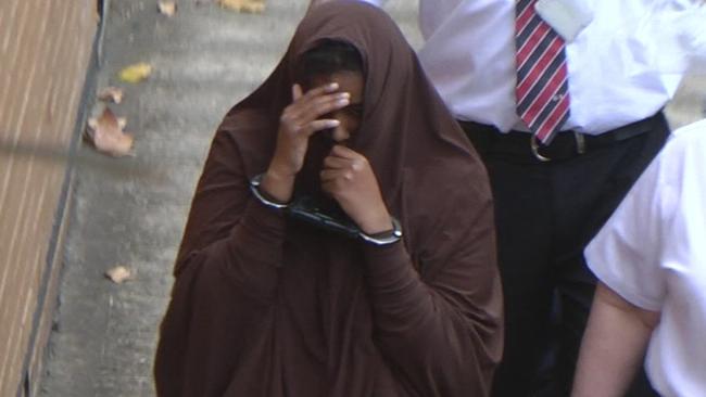 Zainab Abdirahman-Khalif being lead into court shortly after being arrested in May 2017. Picture: Nine News