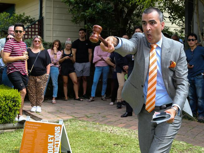 SYDNEY, AUSTRALIA - DECEMBER 12 2020: Auctioneer Michael Garofolo in action during a home auction in West Ryde, in Sydney Australia. Picture: Newscorp: Daily Telegraph / Gaye Gerard