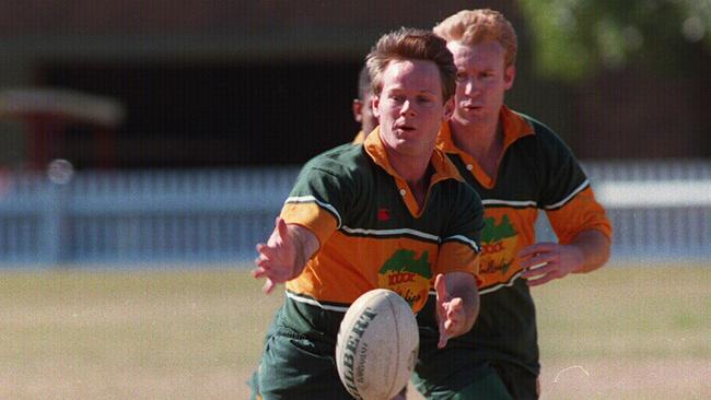 Pat Howard displays his slick passing skills at Wallaby training.