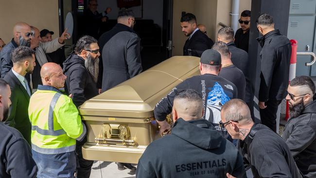 His body arrived in a gold coffin. Picture: News Corp Australia