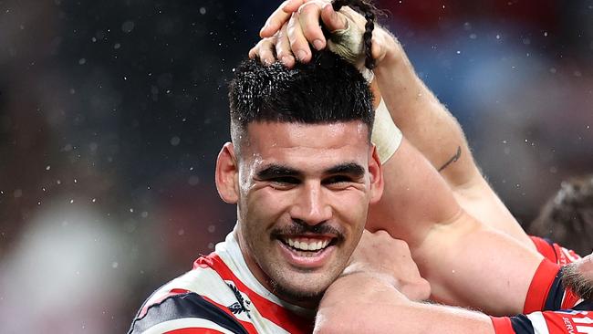 SYDNEY, AUSTRALIA - JUNE 30: Terrell May of the Roosters celebrates with team mates after scoring a try during the round 17 NRL match between Sydney Roosters and Wests Tigers at Allianz Stadium, on June 30, 2024, in Sydney, Australia. (Photo by Brendon Thorne/Getty Images)