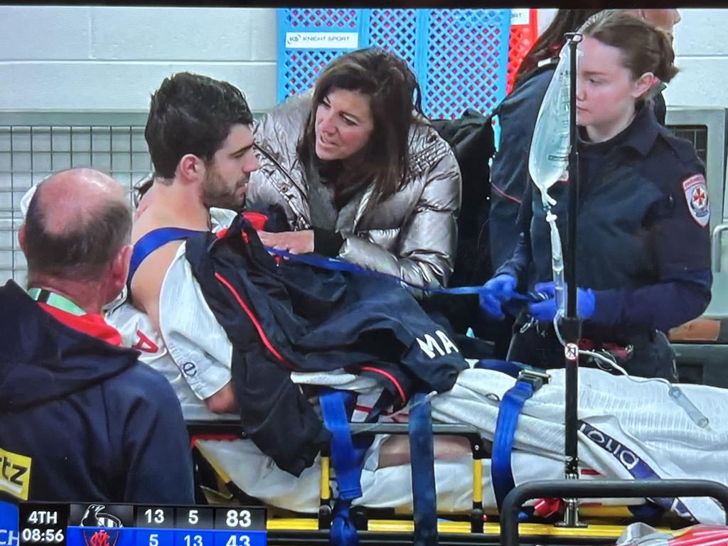 Christian Petracca on his way to hospital after an accidental knee in the ribs