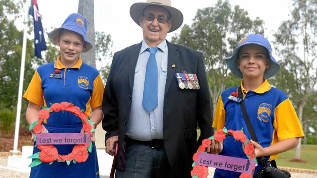 Maddison Jaggers McPhee, Tom Kerr and Riley Bloomfield at the Stenhouse Park monument. Picture: Jann Houley