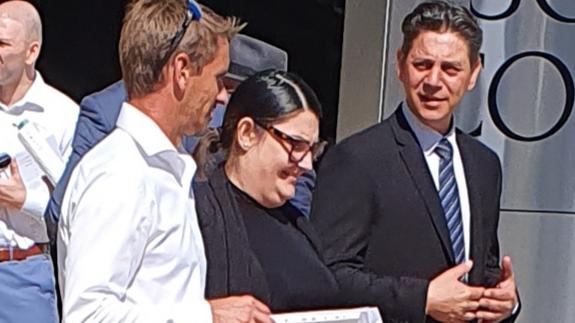 Gold Coast man Ricky John Zeller (front left, white shirt) walks from Southport Magistrates Court with his defence lawyer Natasha Shorter and a friend on Tuesday.