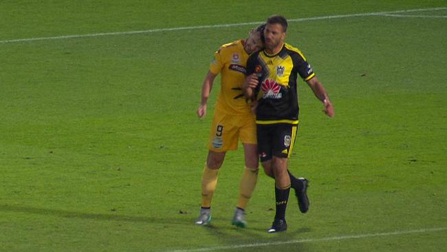 Central Coast Mariners’ Roy O’Donovan headbutts Wellington Phoenix’s Manny Muscat.