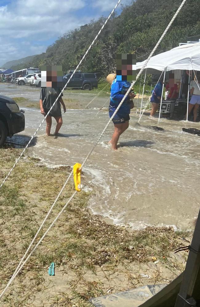 CRAZY TIDES: Teewah Beach camper Kath D Wino was caught off-guard by the high tides from ex tropical cyclone Seth, and had water come right into her campsite. Photo: Facebook