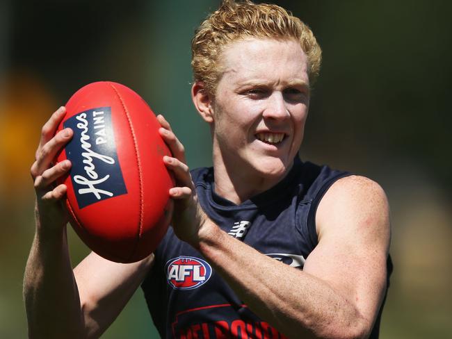 MELBOURNE, AUSTRALIA - DECEMBER 13:  Clayton Oliver of the Demons looks fatigued upfield during a Melbourne Demons AFL training session at Gosch's Paddock on December 13, 2017 in Melbourne, Australia.  (Photo by Michael Dodge/Getty Images)