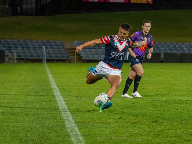 Cassius Tia kicks for goal in the SG Ball Cup. Picture: Thomas Lisson