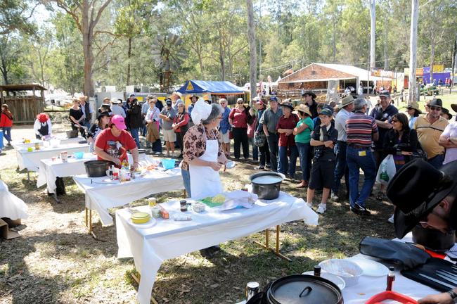 Marian Gauci chats to the crowd as she cooks in the Muster Chef competition. Picture: Craig Warhurst