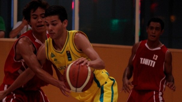 Darryl McDowell-White junior playing for Australia at the FIBA Oceania Championships.