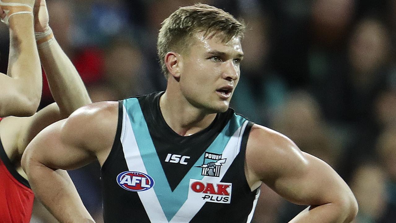 Ollie Wines has asked his brother not to have a go at Kane Cornes again. Photo: Sarah Reed