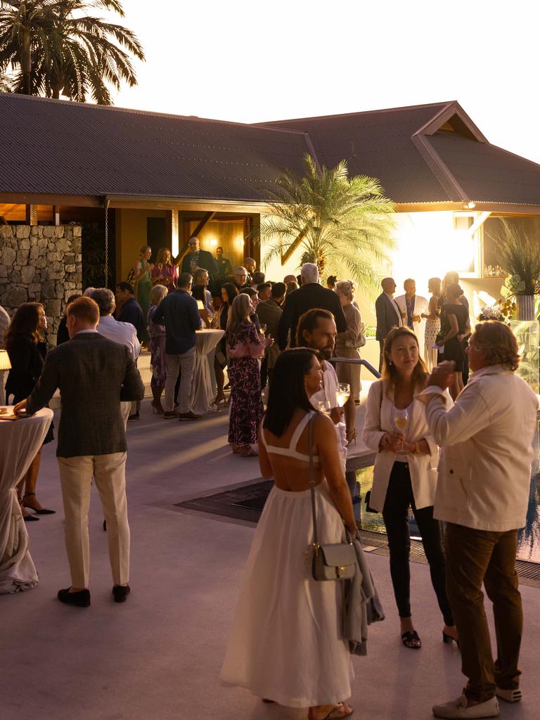 Guests arrive for the Guillaume Brahimi dinner at Qualia's Pebble Beach. Picture: Lean Timms