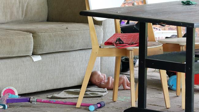 The backyard patio strewn with toys at Rowan Baxter's home. Picture: Liam Kidston