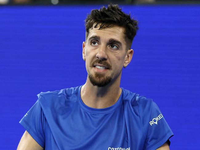 MELBOURNE, AUSTRALIA - JANUARY 15: Thanasi Kokkinakis of Australia reacts in the Men's Singles Second Round match against Jack Draper of Great Britain during day four of the 2025 Australian Open at Melbourne Park on January 15, 2025 in Melbourne, Australia. (Photo by Daniel Pockett/Getty Images)