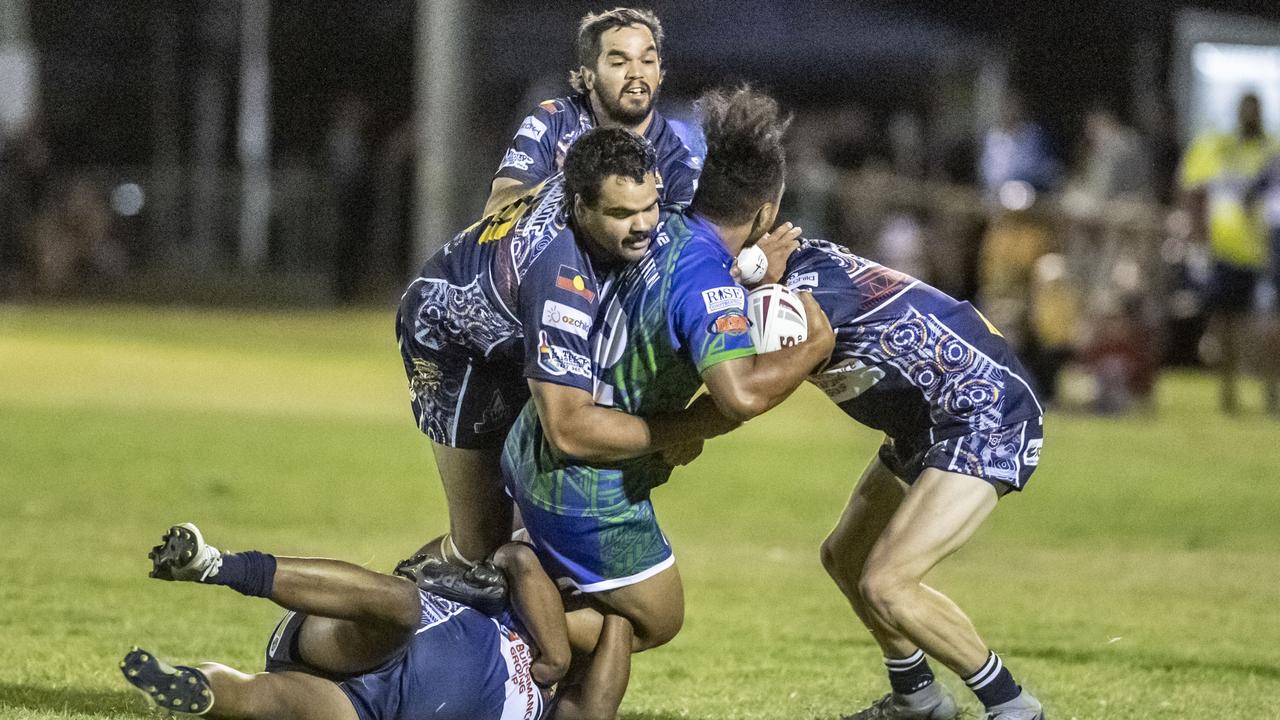 Sione Lopamaua for Pacific wrapped up by Emus. 2023 TRL Cultural Cup, SW Qld Emus vs Pacific Nations Toowoomba. Saturday, February 25, 2023. Picture: Nev Madsen.