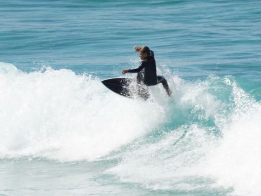 Sidney Taylor surfing