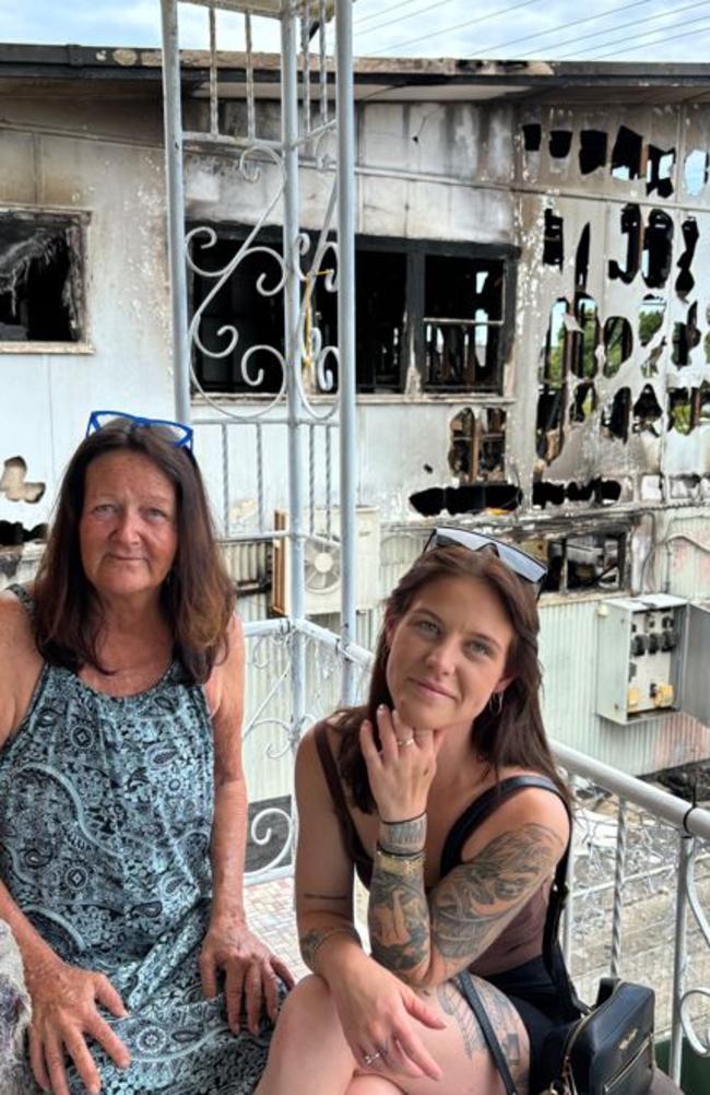 Helen Daws and her niece, Olivia Kuhl, outside her firebombed home. Picture: Supplied.