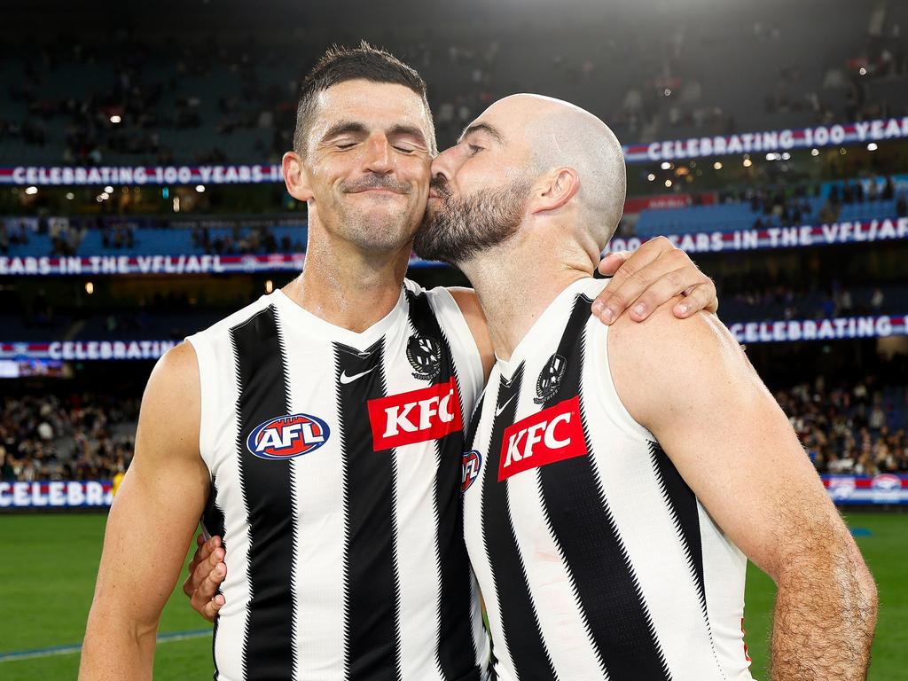 Sealed with a kiss for the two record breakers.