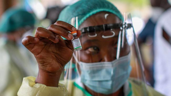 A health worker holds the Sinopharm vaccine before administering it to a patient at Wilkins Infectious Diseases Hospital in Harare, Zimbabwe, last week. Picture: Getty Images