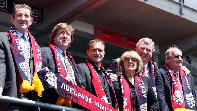 Former Reds chief executive officer Glenn Elliott welcomes new owners Greg Griffin, Bruno Marveggio, patron Fay Gerard, Rob Gerard and Richard Noble in 2010.