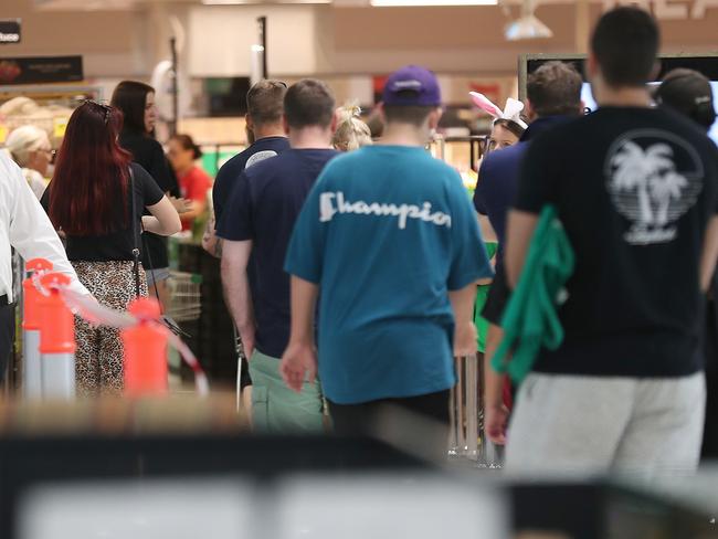 Shoppers pack in to Woolworths Skygate yesterday. Picture: Annette Dew