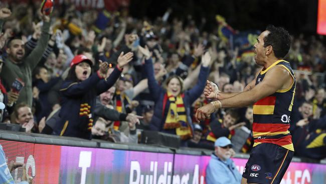 Eddie Betts and his adoring fans after kicking a goal from the boundary line against the Gold Coast in 2019. Picture: SARAH REED