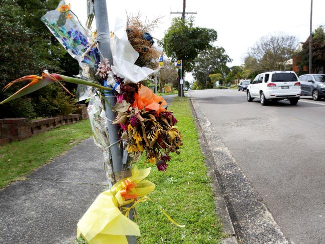 A floral tribute at scene of the fatal crash at Mann St, North Gosford.