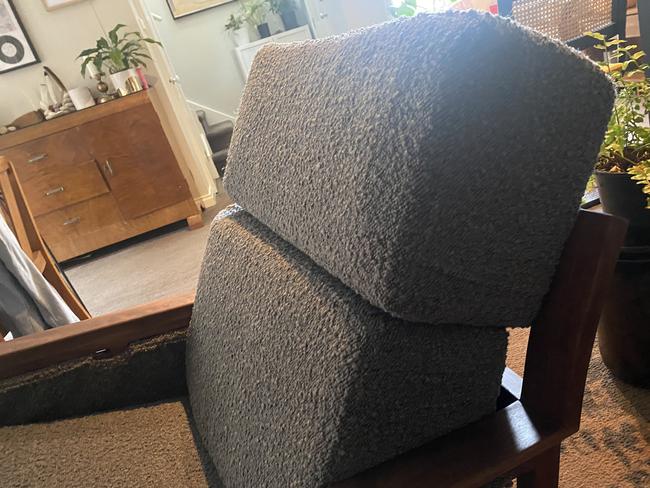 An upholsterer had just finished putting the final touches on the lovingly made chair.