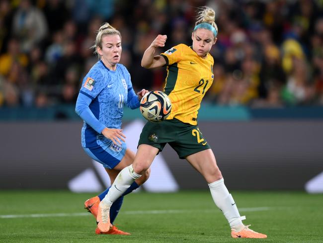 Ellie Carpenter is put under pressure by Lauren Hemp, en route to England’s second goal. Picture: Justin Setterfield/Getty Images